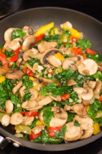 vegetables cooking in the skillet for breakfast