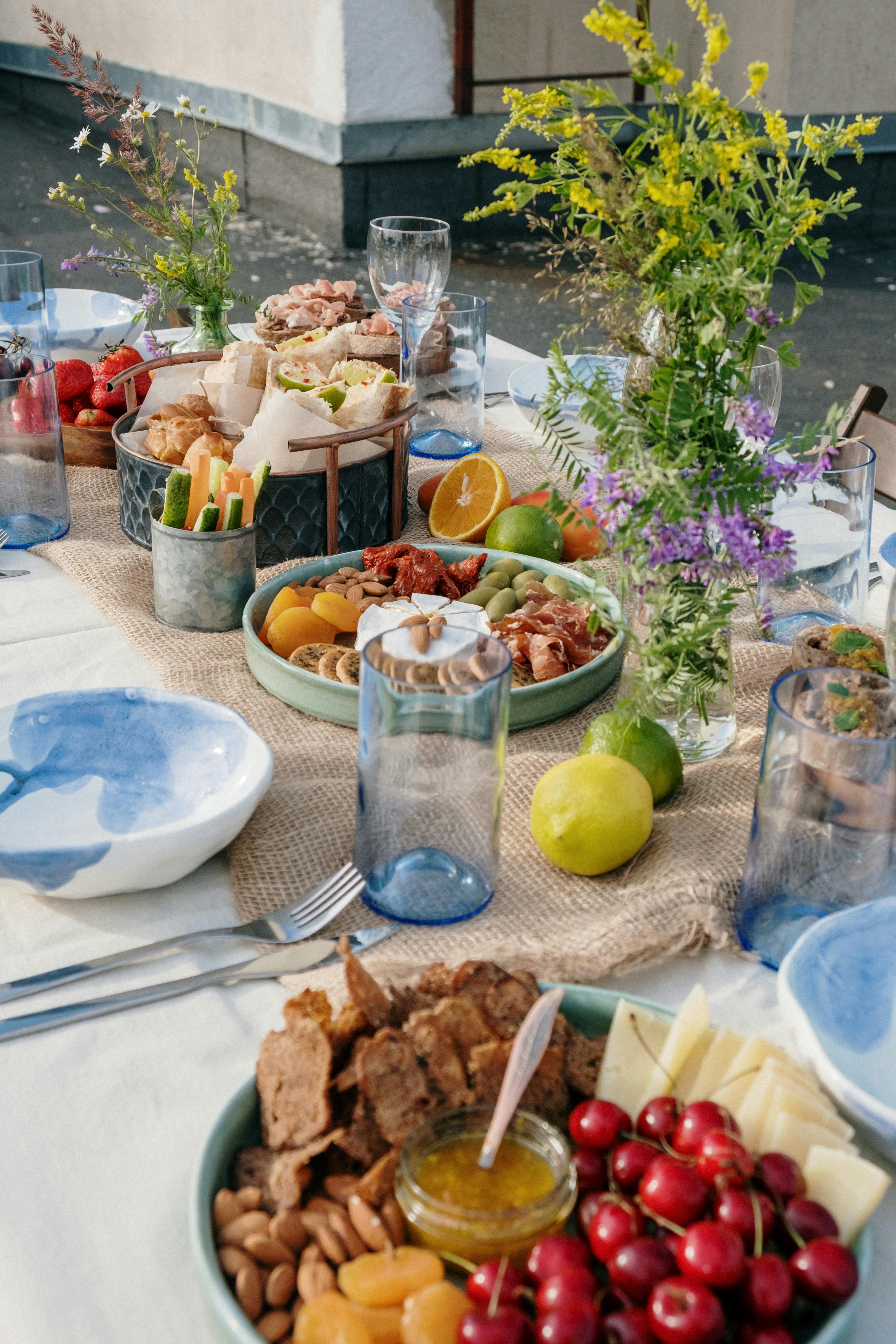 Variety of food on table outdoors to show non-diet eating and feeling normal with food