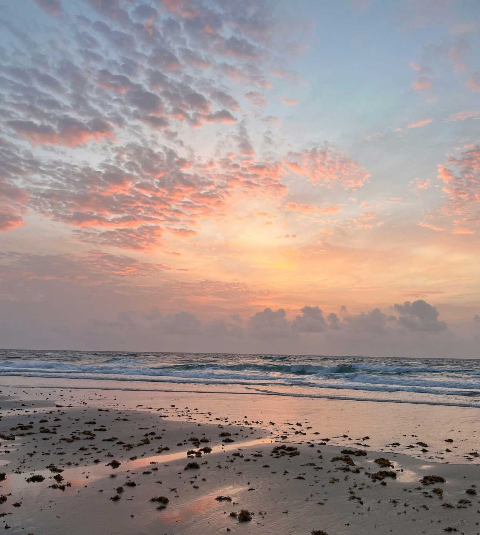 Soft beach sunrise for Coast Nutrition Co who teaches you the Calm Eating Method
